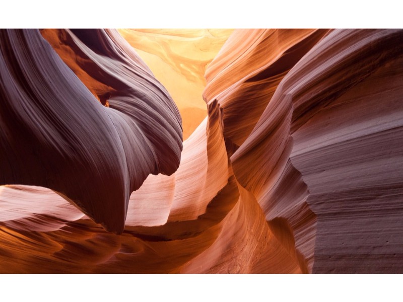 yellow and orange rock curves of lower antelope canyon