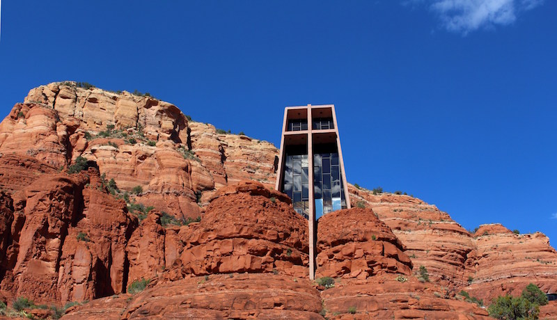 11the sky reflected on the windows of the chapel of the holy cross in sedona
