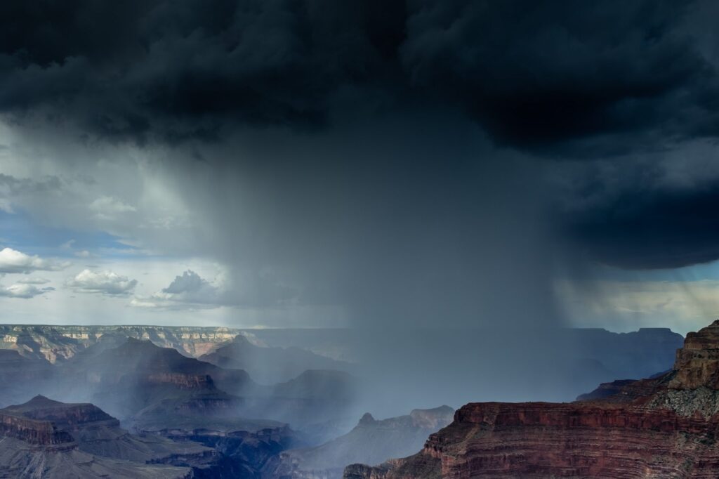 heavy rain falling over the grand canyon