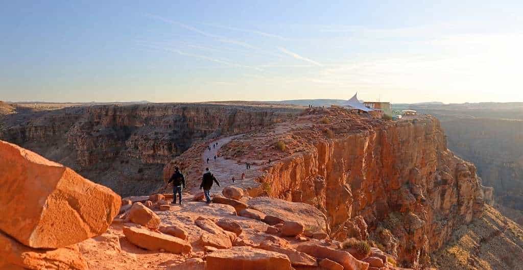 walking along the rim of the grand canyon