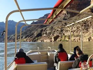 people on a grand canyon fly float adventure floating through the colorado river