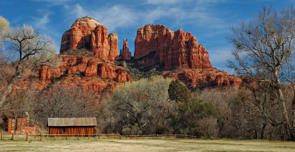 a barn in front of cathedral rock in sedona, az