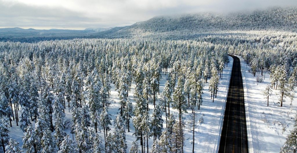 aerial view of a snowy road scene in northern arizona