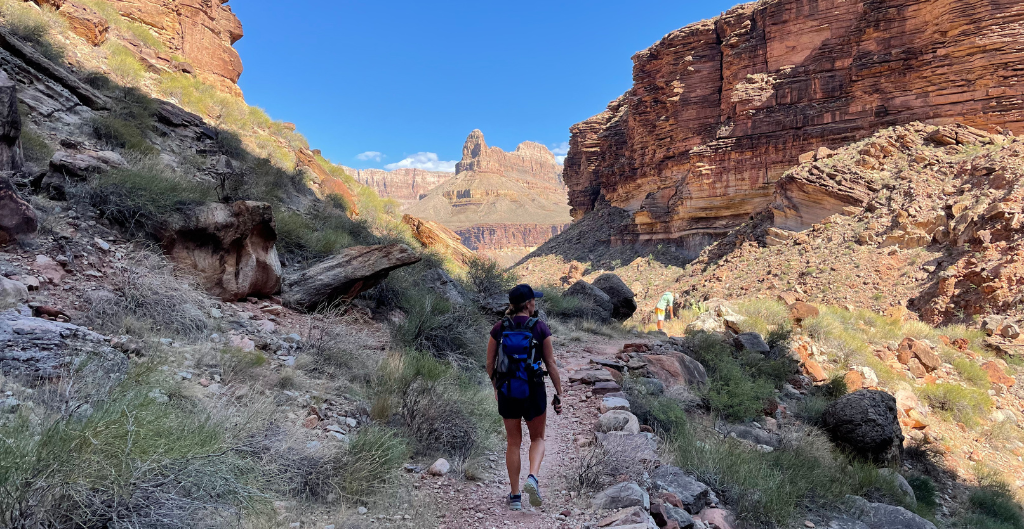 woman hiking on a grand canyon corporate trip