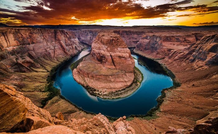 horseshoe bend with glowing sky